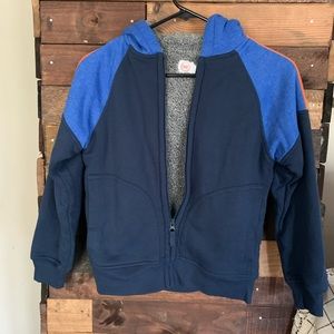 Boys winter coat Never worn. Has built in name tag